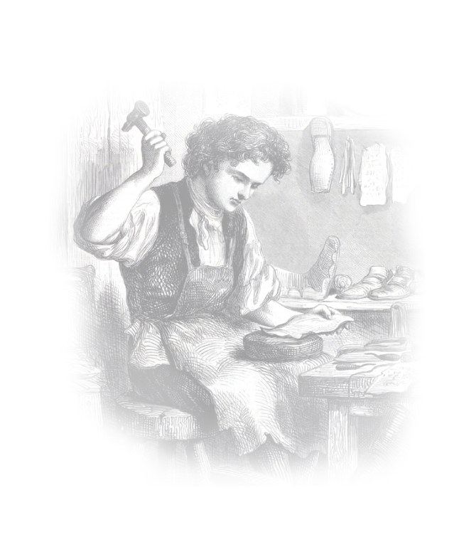 An apprentice learning the craft at the workbench